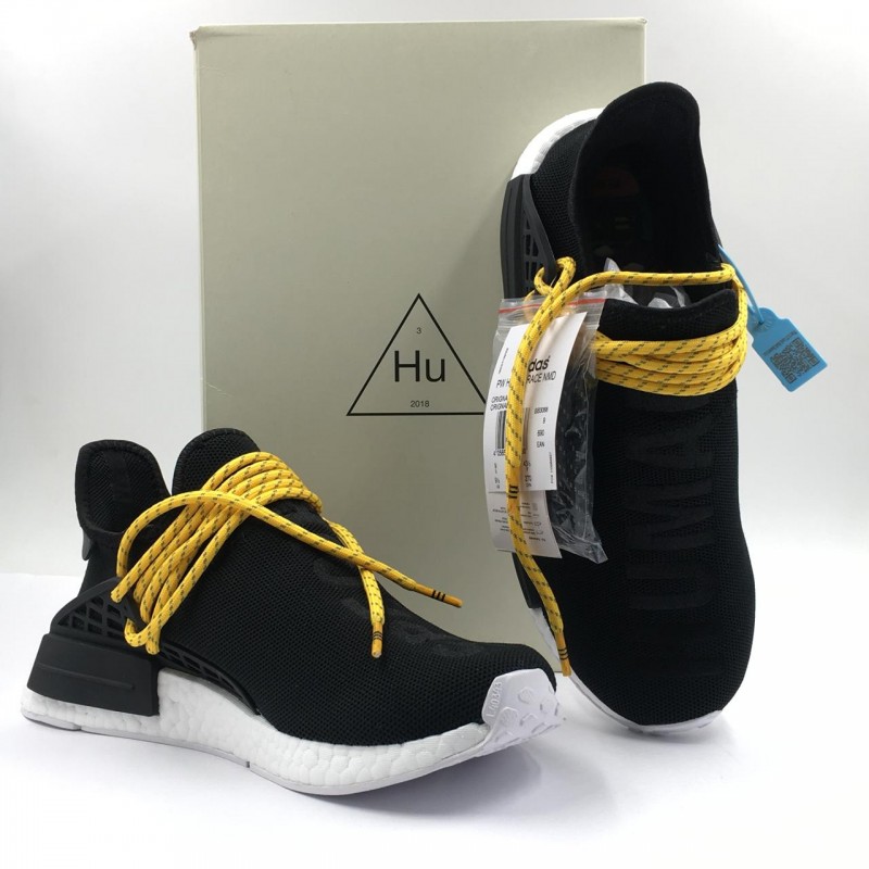 nmd human race black yellow